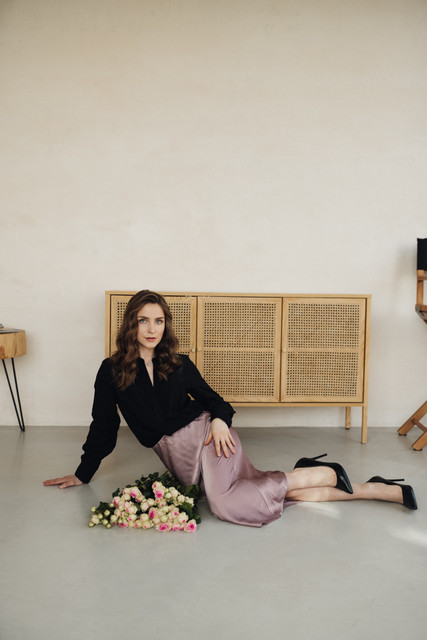 Modern Elegance: Black Blouse & Pink Satin Skirt Outfit and Styling Ideas for a Chic Lookbook