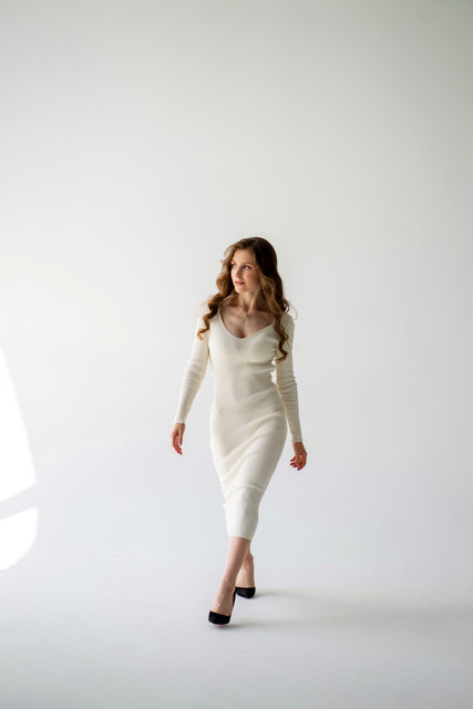 Sophisticated Ribbed Midi Dress: Black & Cream Editorial Photoshoot References