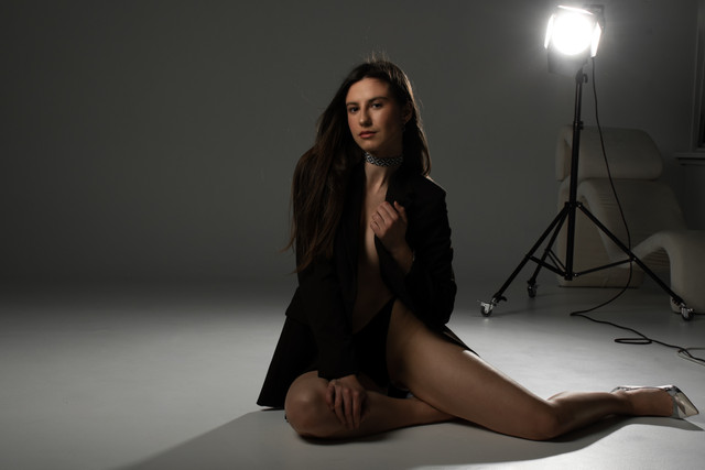 Dramatic Studio Editorial Photoshoot References: Oversized Blazer & Dark Glamour Styling
