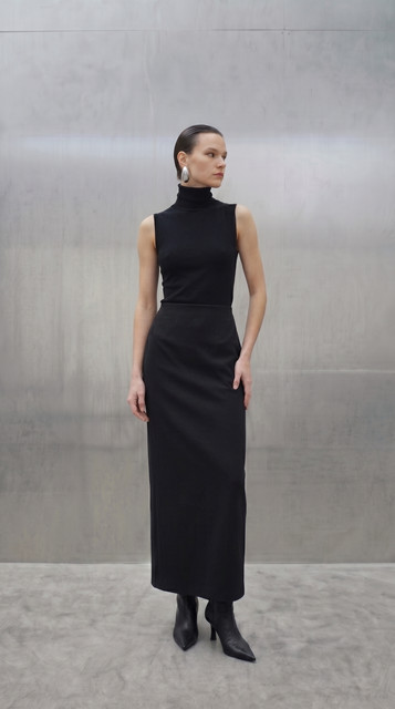 Sleek Black Monochrome Styling: Modern Minimalist Full-Length Looks, a Lookbook-Style Set
