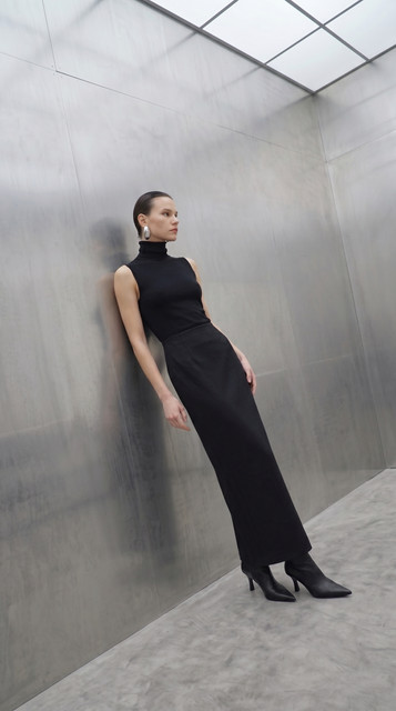 Sleek Black Monochrome Styling: Modern Minimalist Full-Length Looks, a Lookbook-Style Set