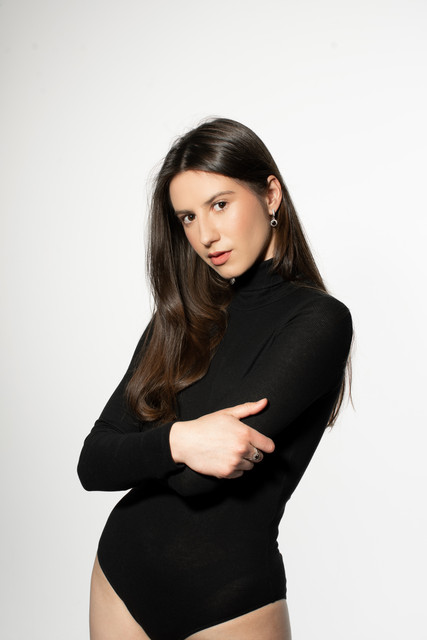 Confident Black Turtleneck Bodysuit & Boots: Minimalist Studio Styling Reference Photo Set
