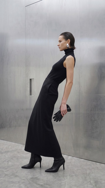 Sleek Black Monochrome Styling: Modern Minimalist Full-Length Looks, a Lookbook-Style Set