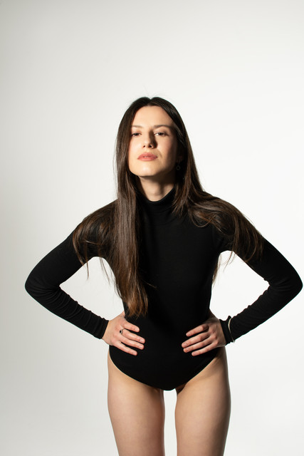 Confident Black Turtleneck Bodysuit & Boots: Minimalist Studio Styling Reference Photo Set