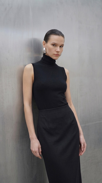 Sleek Black Monochrome Styling: Modern Minimalist Full-Length Looks, a Lookbook-Style Set