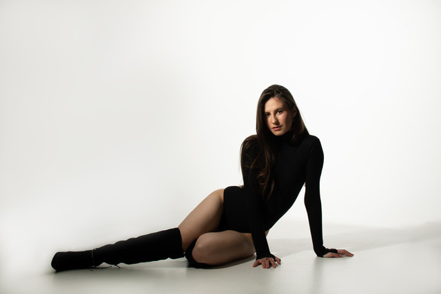 Confident Black Turtleneck Bodysuit & Boots: Minimalist Studio Styling Reference Photo Set