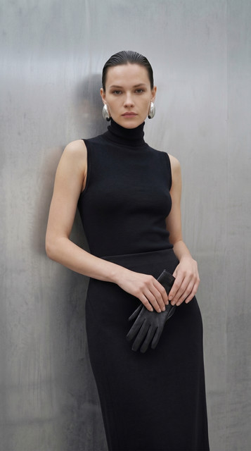 Sleek Black Monochrome Styling: Modern Minimalist Full-Length Looks, a Lookbook-Style Set