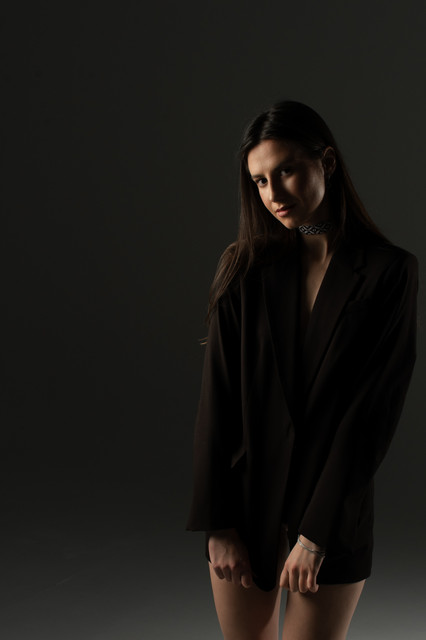 Dramatic Studio Editorial Photoshoot References: Oversized Blazer & Dark Glamour Styling
