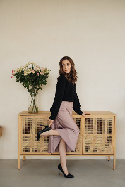 Modern Elegance: Black Blouse & Pink Satin Skirt Outfit and Styling Ideas for a Chic Lookbook