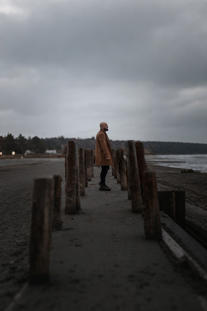 Contemplative Coastal Men's Camel Coat Styling: Editorial Visual Reference Pack
