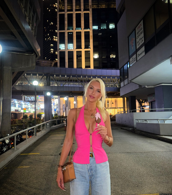 Hot Pink Halter & Wide-Leg Jeans: Urban Night Out Styling Reference Photo Set