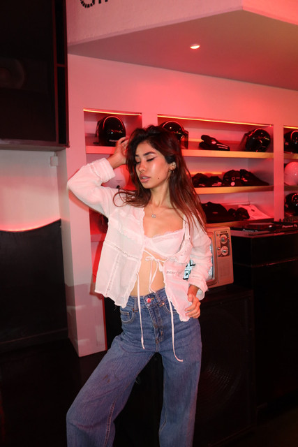 Red-Lit Industrial Chic: Denim & Lace Night Out Outfit and Styling Ideas