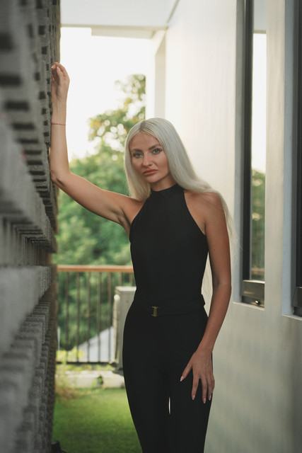 Editorial Photoshoot Pack: Chic Black Halter Jumpsuit for Sophisticated Resort Style