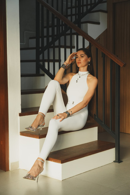 Chic White Jumpsuit Editorial: Modern Staircase Styling Photo Set