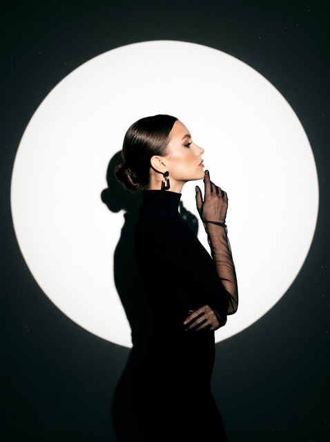 Refined Studio Editorial Photoshoot Pack: Sleek Black Turtleneck & Sheer Gloves in Dramatic Light