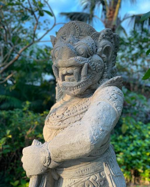 Exotic Resort Ambiance: Stone Guardian & Lush Garden Styling Reference Set