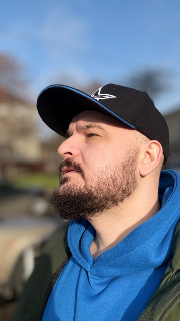 Urban Comfort: Blue Hoodie & Cap Casual Outdoor Style editorial photoshoot references