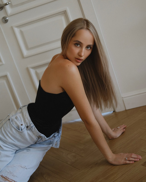 Modern Casual: Black Bodysuit & Ripped Jeans Styling Idea - Editorial Photoshoot References