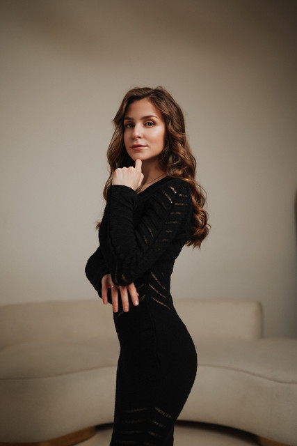 Sophisticated Ribbed Midi Dress: Black & Cream Editorial Photoshoot References