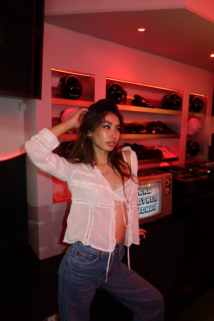 Urban Nightlife Sheer Top & Denim Styling photo set: Red-Lit Edgy Evening Look